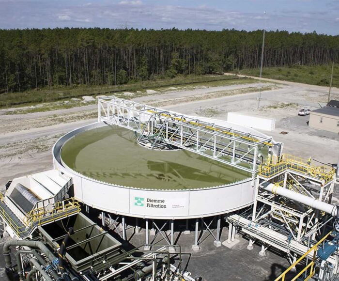 A Diemme Filtration high-rate tailings thickener operating in a mineral processing plant, highlighting its robust, large-scale construction.