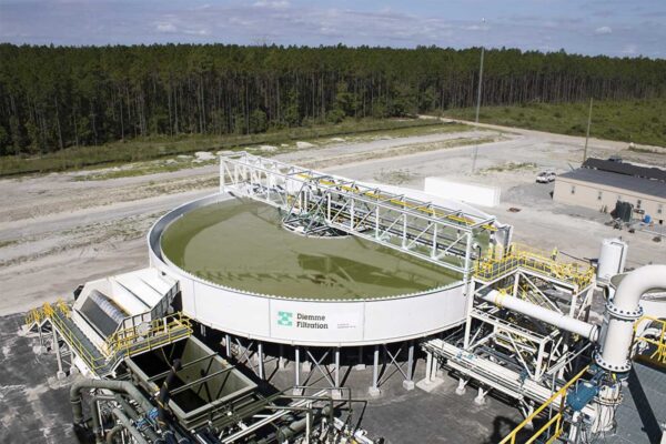 A Diemme Filtration high-rate tailings thickener operating in a mineral processing plant, highlighting its robust, large-scale construction.