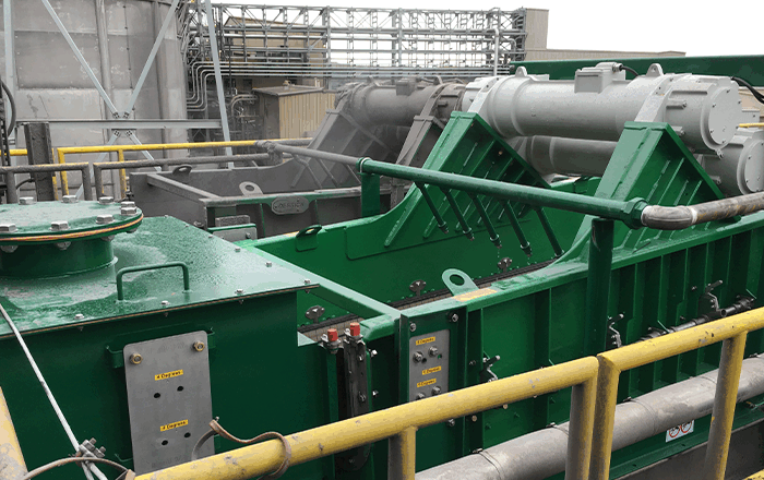 Managing coarse solids for a more reliable filter press